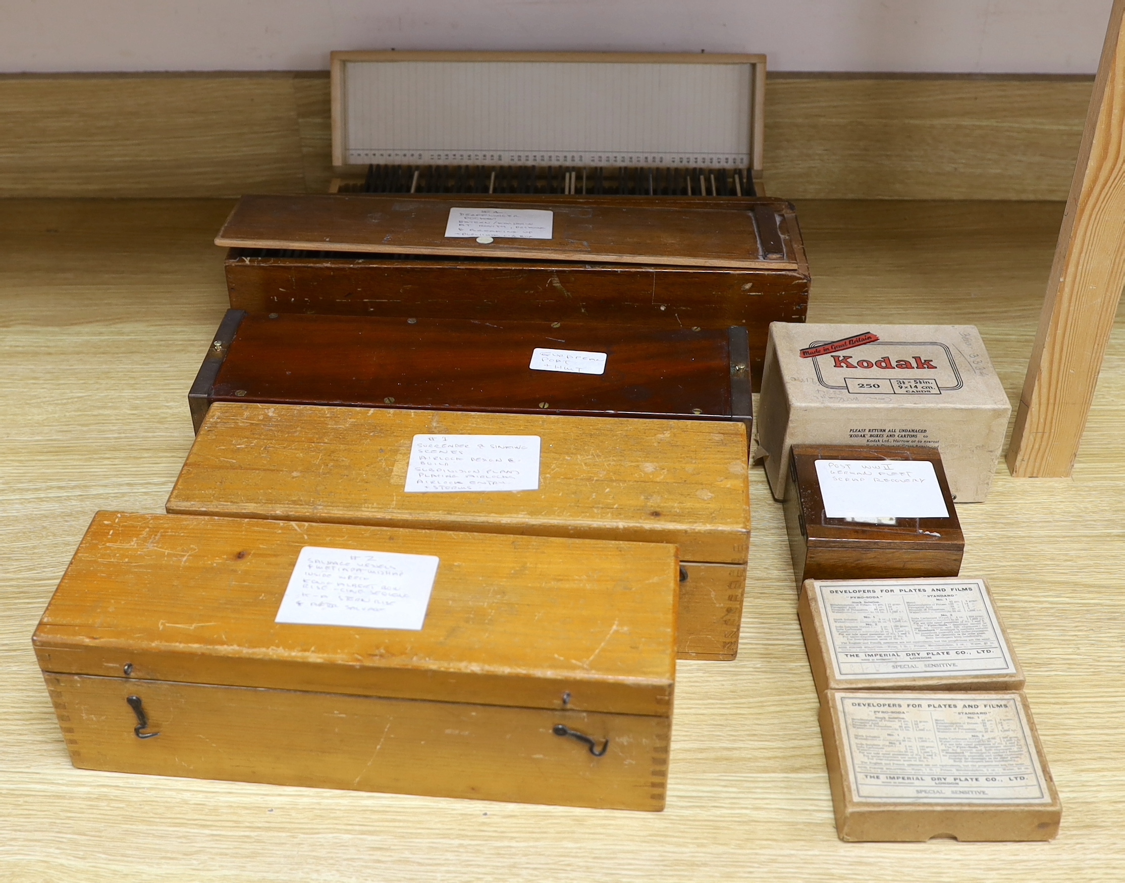 A collection of Magic Lantern boxed slides and quarter plate negatives, shipping and naval recovery